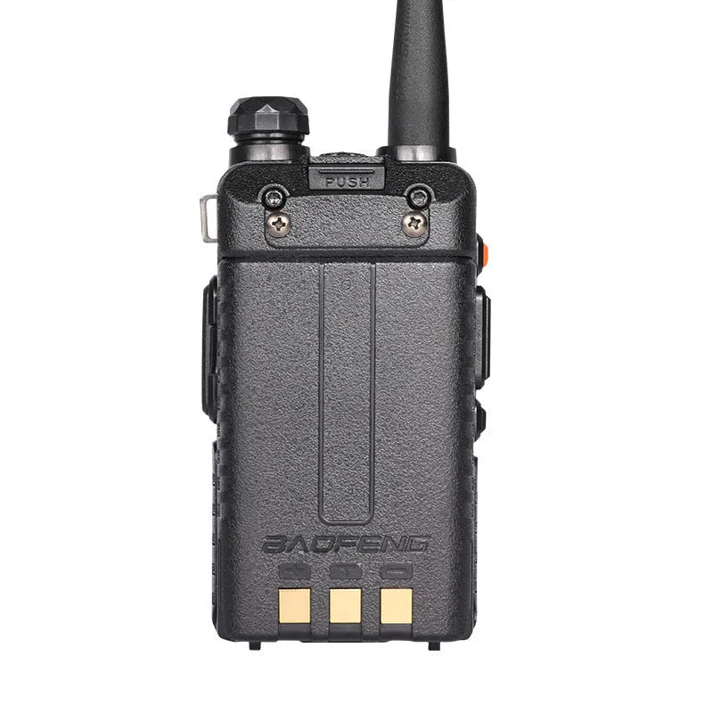 A compact black handheld walkie talkie with an antenna, showing its numeric keypad and display screen.