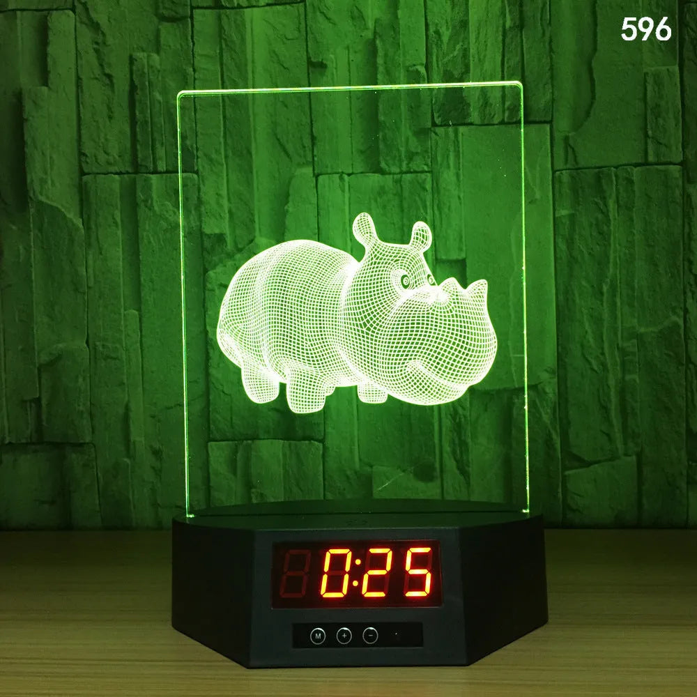 Dolphin-shaped 3D night light table lamp with wireless charging pad and remote control on wooden surface