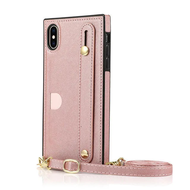 Black leather iPhone case with an attached wristband holster, shown next to a Red and a Rose Gold version.