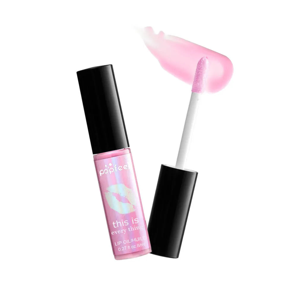 Transparent lip gloss with multivitamins in a clear tube, available in multiple colours