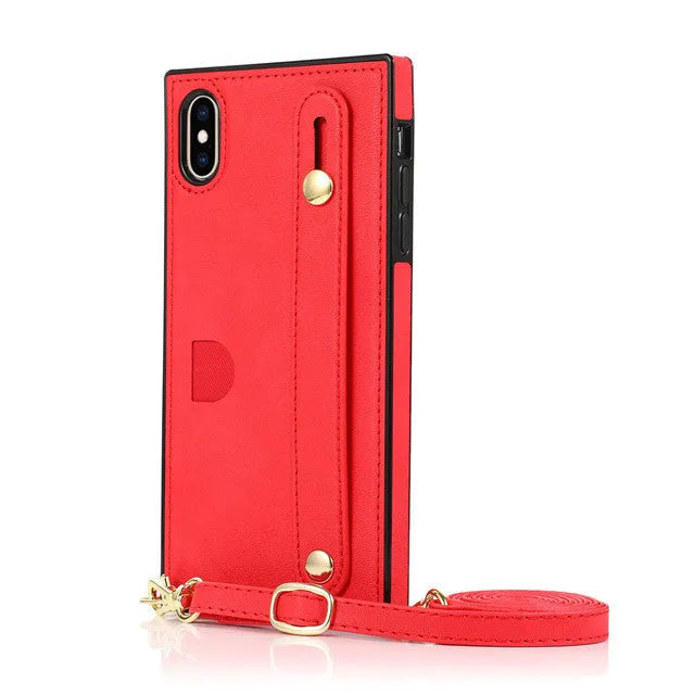 Black leather iPhone case with an attached wristband holster, shown next to a Red and a Rose Gold version.