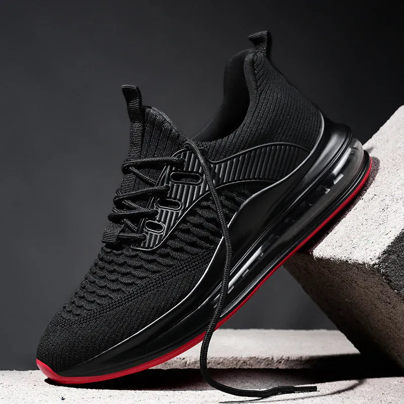 Men's low-top black mesh running shoes with white rubber sole and lace-up front.