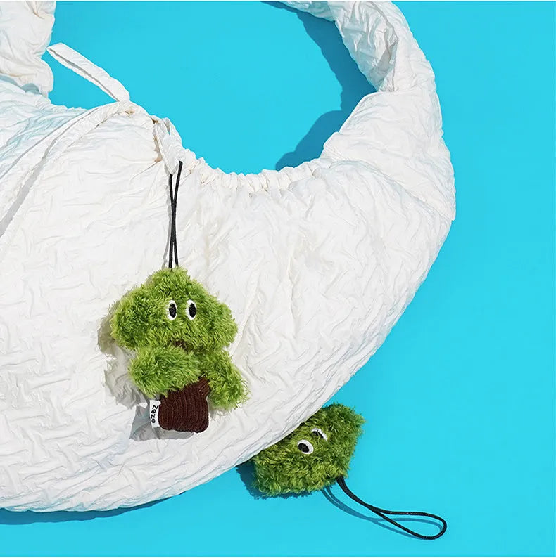 Pine tree shaped plush cat hanging toy with mint filling measuring 10cm by 12cm