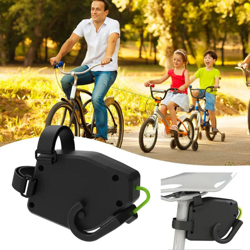 Black plastic bicycle trailer rope connecting adult bike to child trailer for family cycling