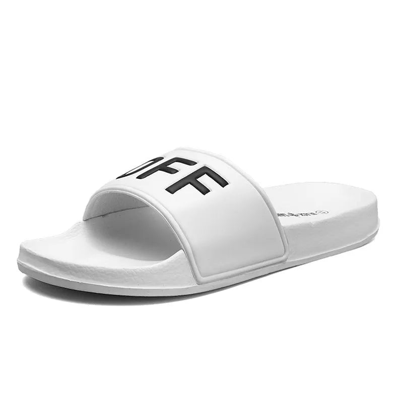 A pair of open-toe men's slippers with a rubber sole, shown in black and white colour options.