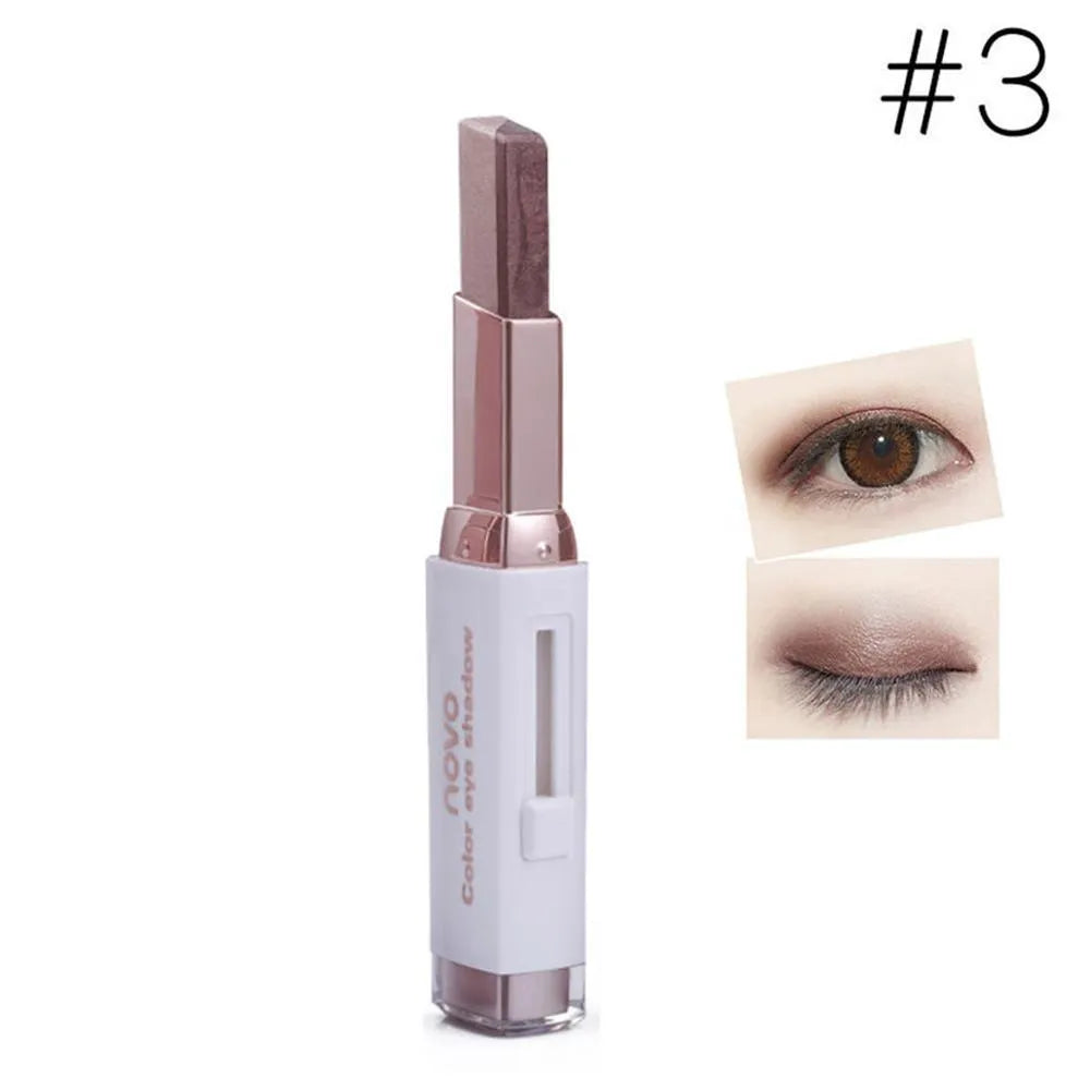 Two-color gradient eye shadow stick with smudge effect and push-button release