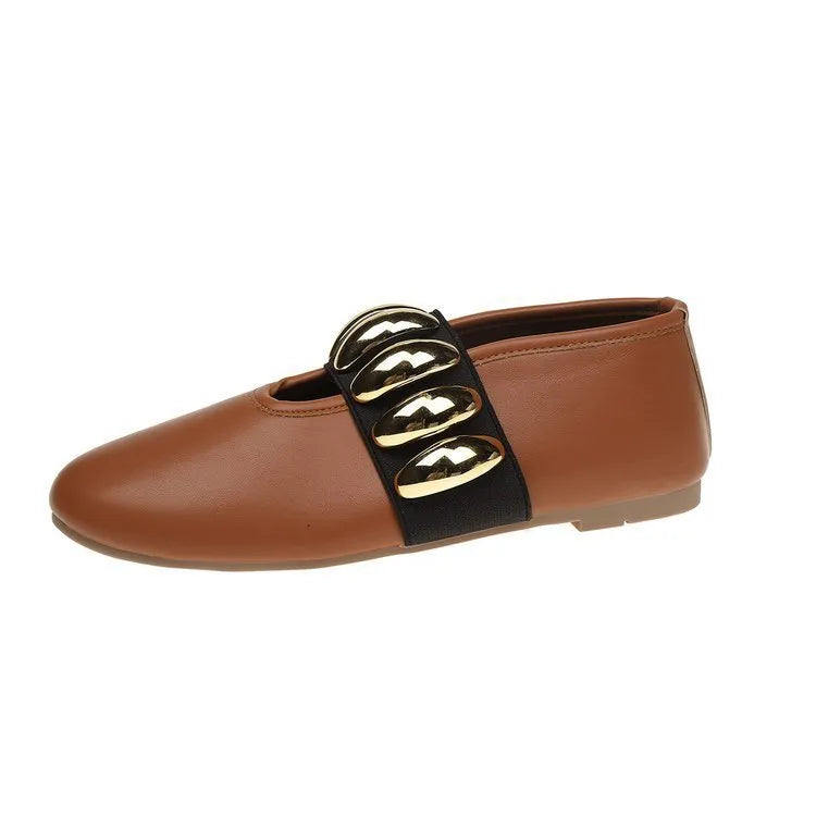 Brown artificial PU flat loafers for women with metal buckle and round toe, side view
