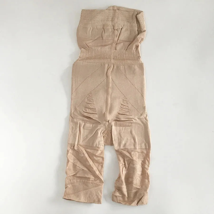 Black high-waisted seamless shapewear shorts for women laid flat on a neutral background.