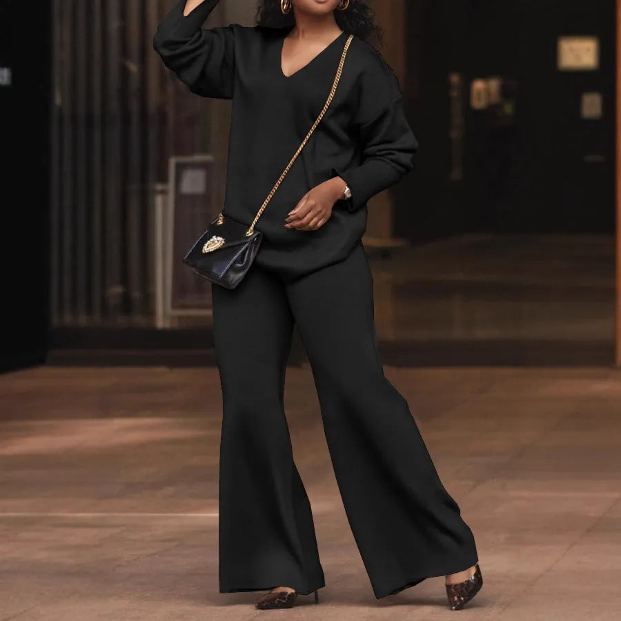 Women's brown thickened suede two-piece suit with split sleeves and trousers in casual style.