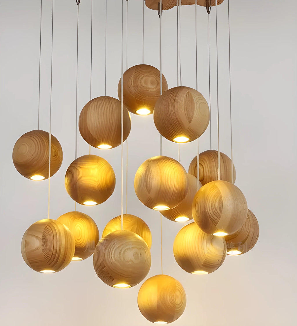 Nordic-style solid wood ball chandelier with adjustable cord and wood disc shade.