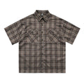 Men's black plaid short sleeve shirt with embroidered letter design on lapel
