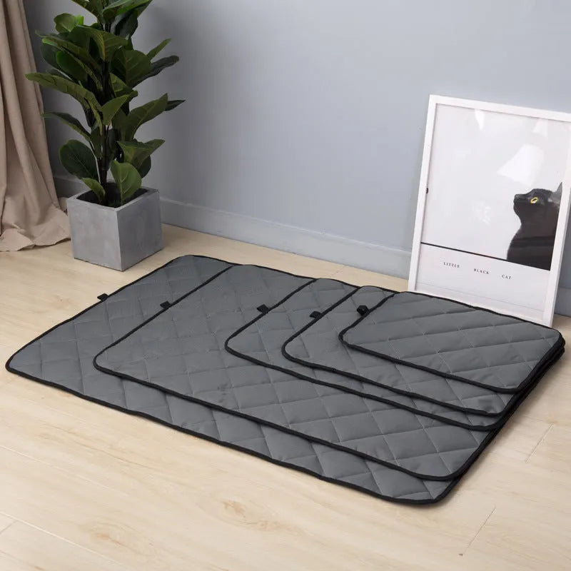 Non-slip cooling pet mat in gray cloth, waterproof and breathable, available in five sizes S to 2XL