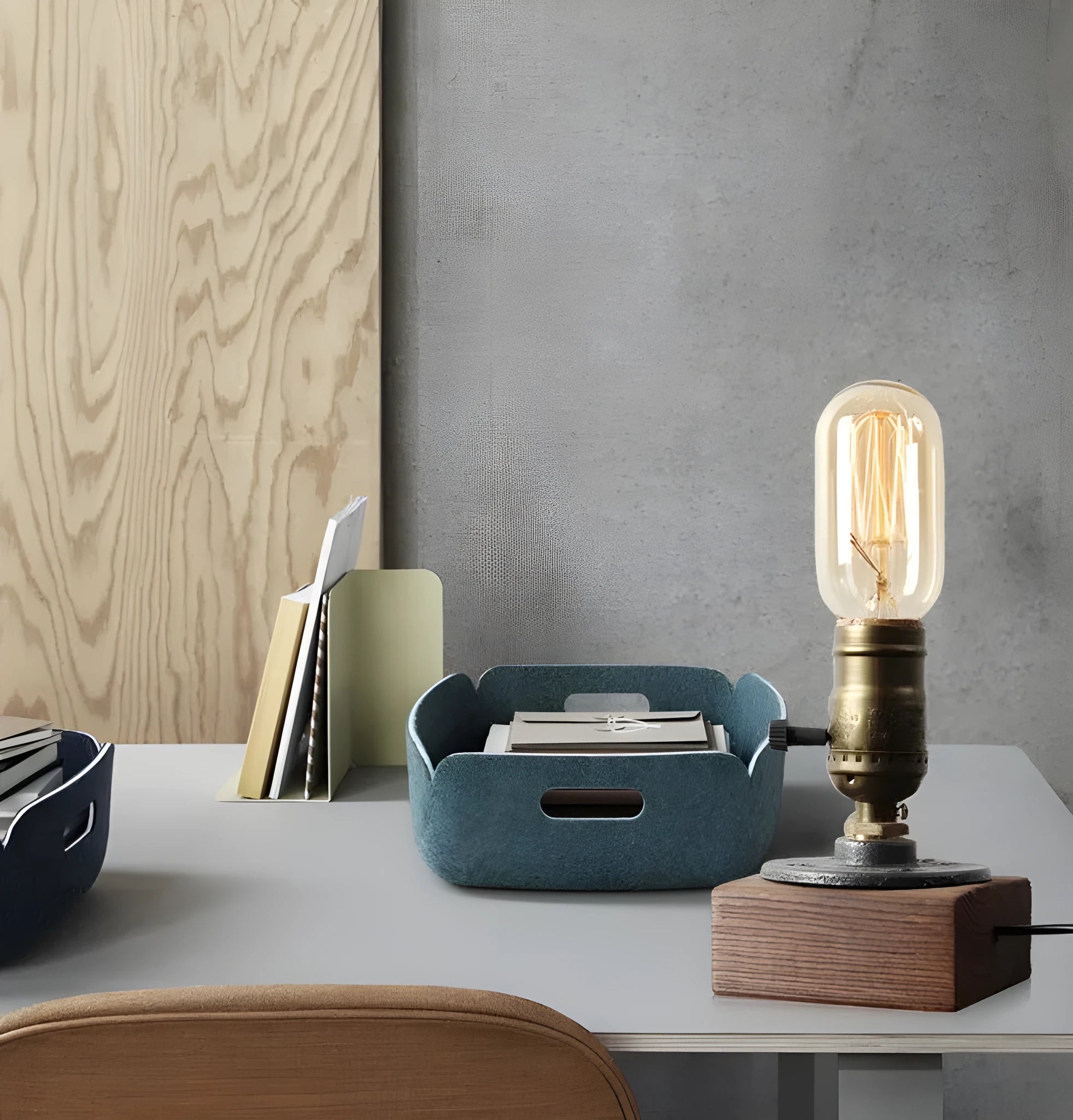 Wood and iron water pipe design table lamp on a surface
