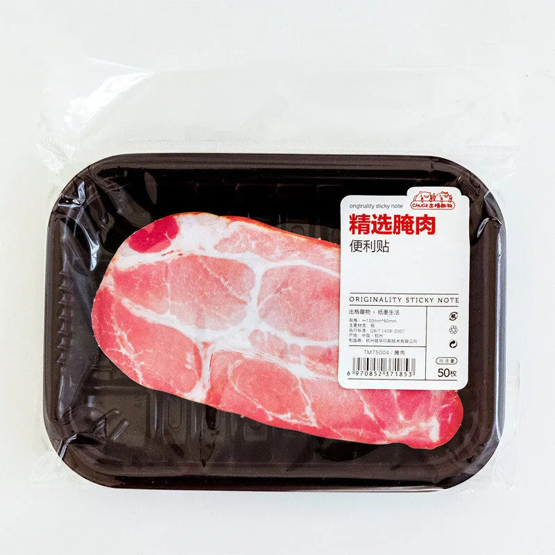 Post-it message notepad with food-themed cover design showing bacon, salmon or pork belly illustration