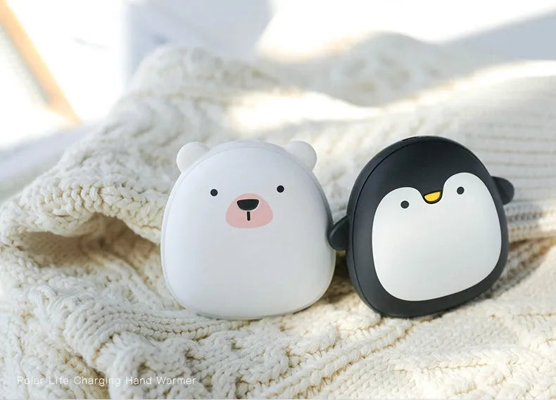 Cartoon penguin and polar bear USB rechargeable hand warmer and power bank showing double-side heating