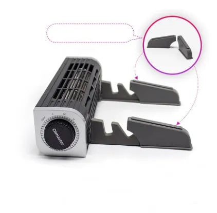 Black notebook cooling pad with large fan grille and USB cable, shown under a laptop.