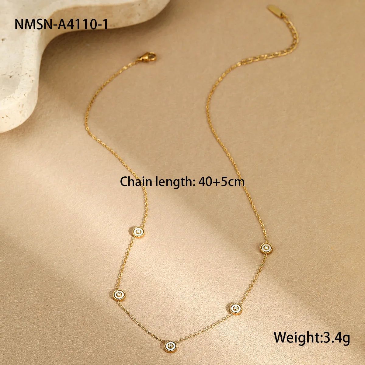 Women's stainless steel bracelet and necklace set with 18K gold plating and geometric design.
