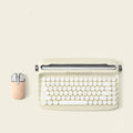 Retro iPad Bluetooth keyboard and mouse set in mint green with blue dual-mode mouse and adjustable bracket