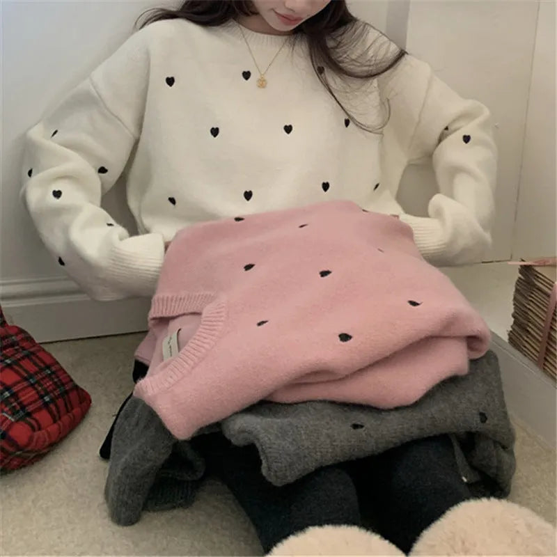 Women's loose fit acrylic pullover sweater with crew neck, long sleeves, and love-pattern embroidery
