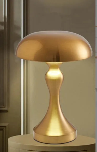 Bronze metallic USB charging desk lamp with touch control for white, warm, and natural light settings.