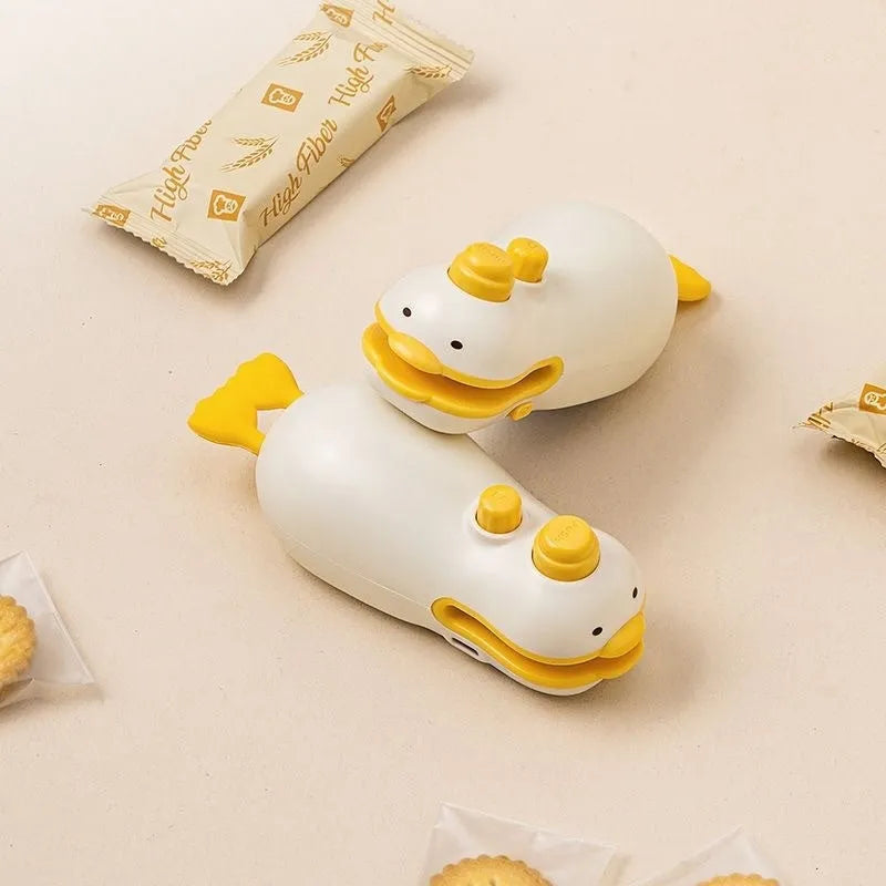 Small yellow duck rechargeable sealing machine with animal jacquard style and charging cable