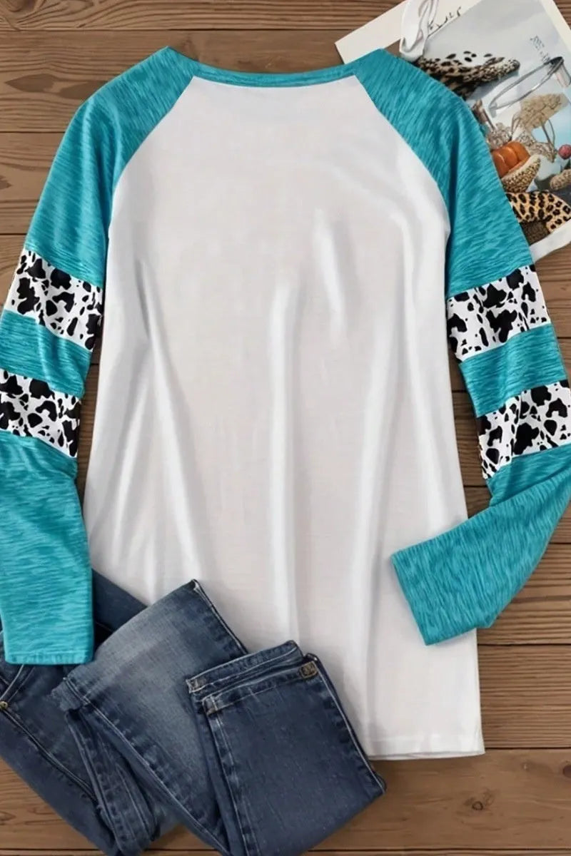 White long sleeve casual T-shirt with a sky blue Halloween pumpkin digital print design.