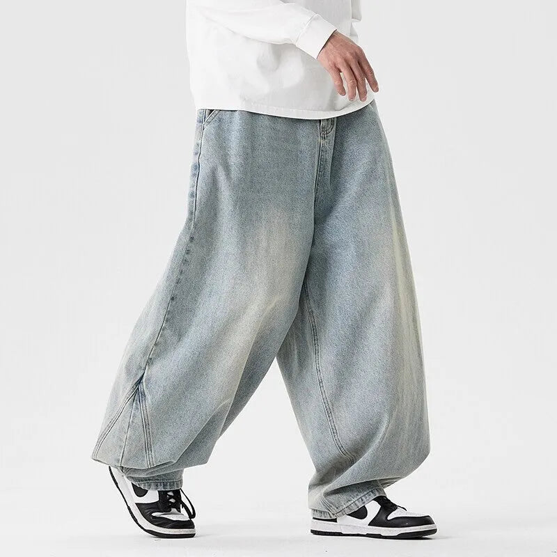 Men's plus size wide leg baggy jeans in cotton denim available in light blue, dark blue, and black colours