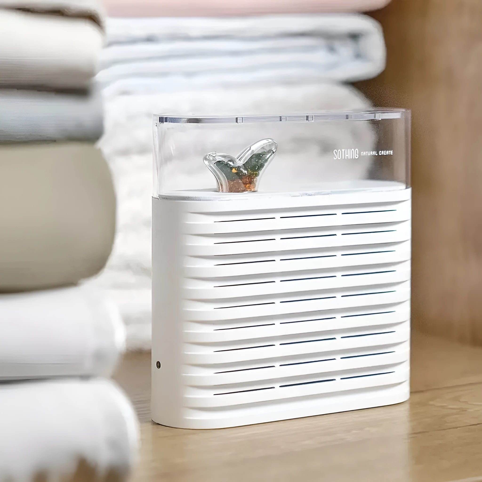 White recyclable cabinet dehumidifier box with transparent top showing colour-changing beads.