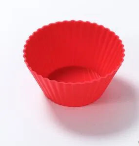 Twelve reusable silicone cupcake liners in six colours, two cups per colour, with a nonstick surface.