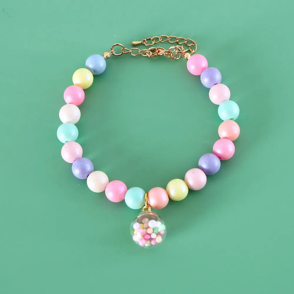 Colourful macaron-themed pet collar, necklace, and bracelet set in resin with adjustable sizing.