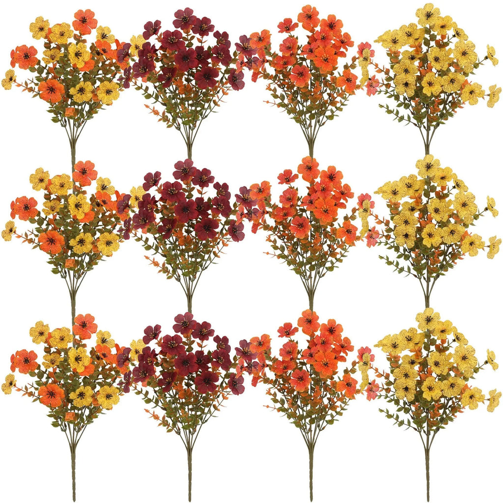 Artificial flower bouquet in autumn colours made from plastic and silk materials.