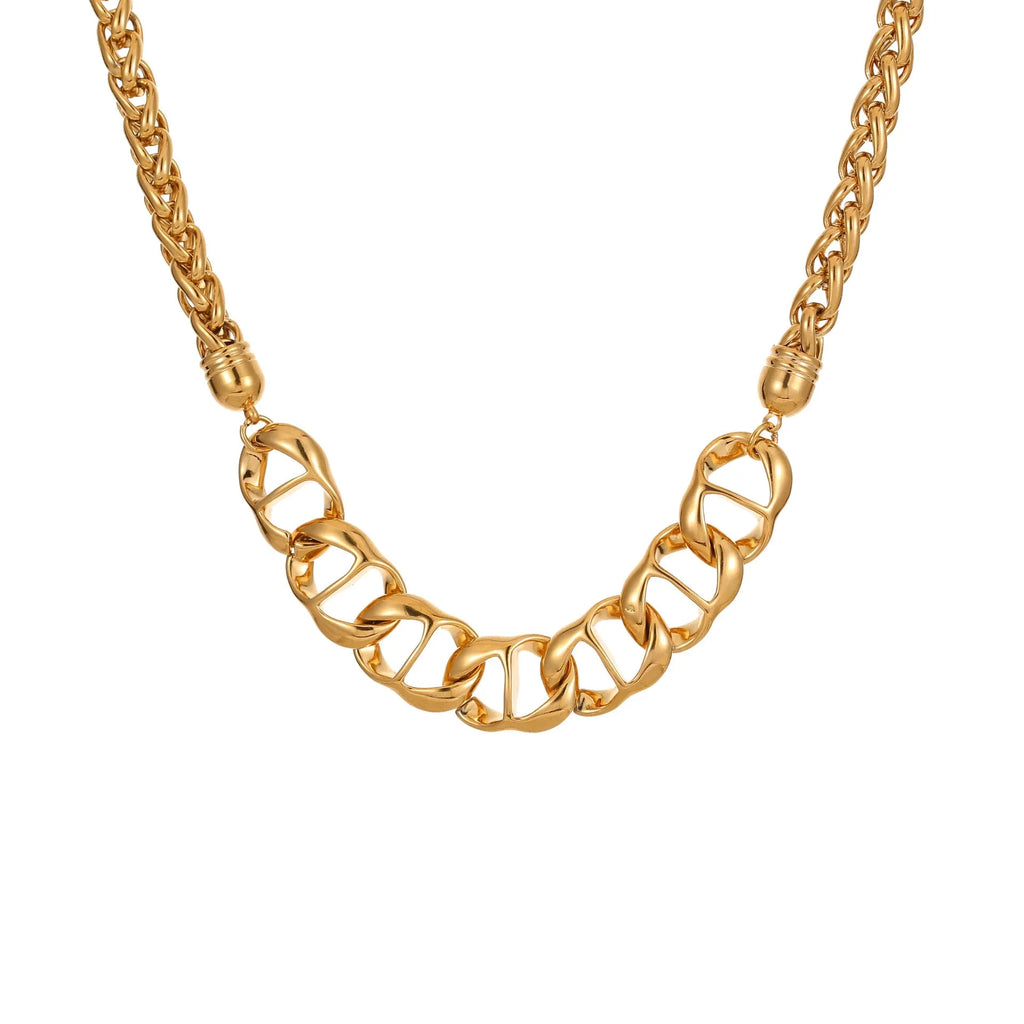Stainless steel geometric pendant necklace with gold electroplated finish on a regular chain.