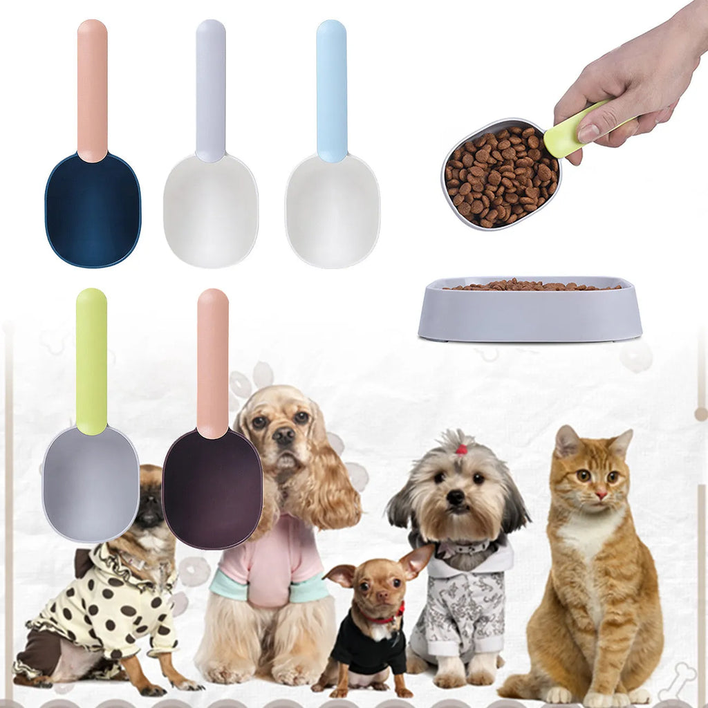 Blue plastic pet food scoop with ergonomic handle and bag clip on a white background