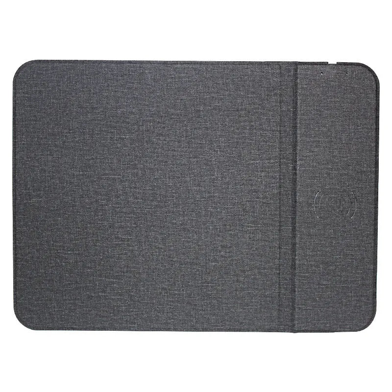 Grey foldable cloth phone holder with integrated wireless charger, showing a mobile phone standing on it at an angle.