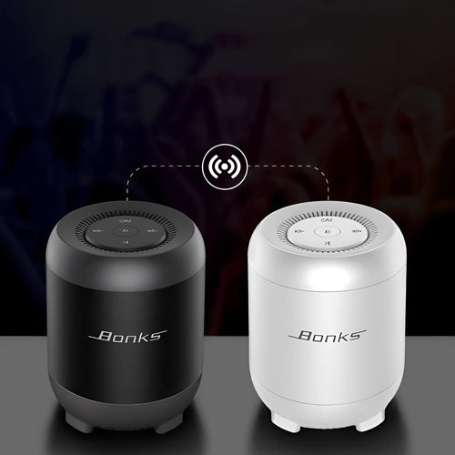 Black and white Bluetooth speaker with AI voice control featuring 16-hour battery and subwoofer boosting