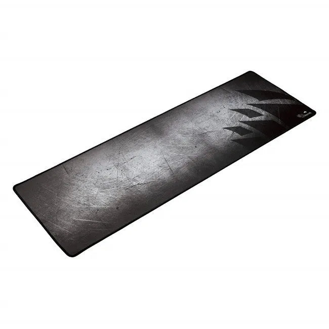 Black thickened non-slip mouse pad with rubber base and cloth surface on a desk