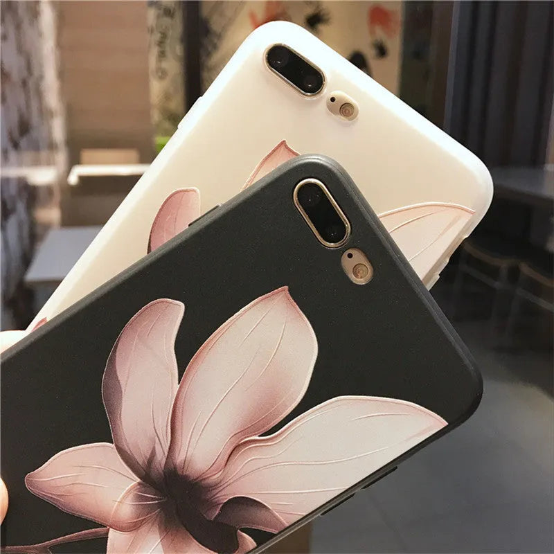 Embossed floral TPU iPhone case in black and white showing raised flower pattern design