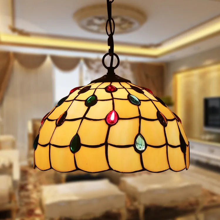 European retro baroque style chandelier in coloured glaze with abstract modelling.