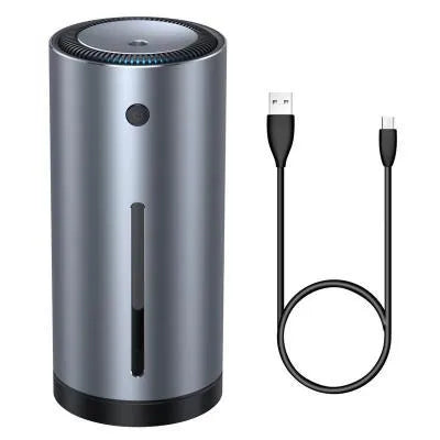 Black aluminium alloy car diffuser humidifier with USB cable, emitting cool mist for vehicle or desktop use.