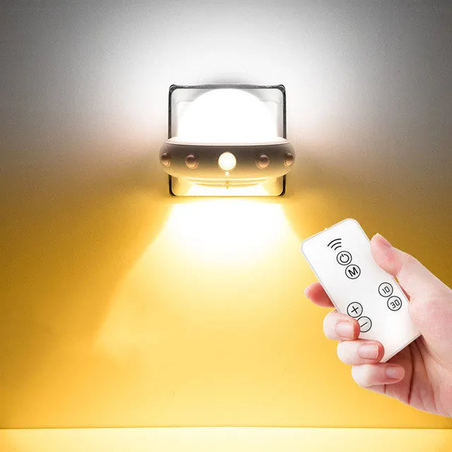 Remote control UFO-shaped bedside night light in blue, pink, or white with cartoon modern design