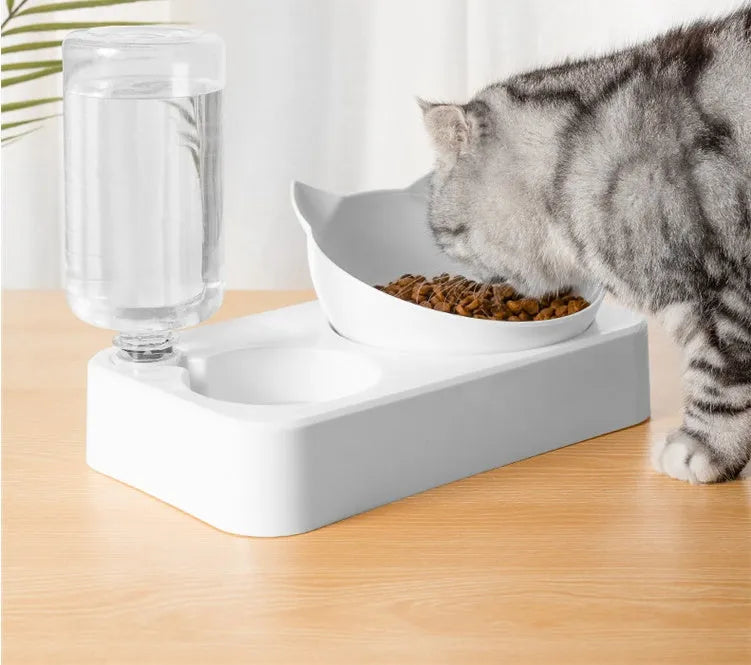 Automatic water storage dog bowl with 15-degree adjustable double bowl, white, showing tilted design for improved eating posture