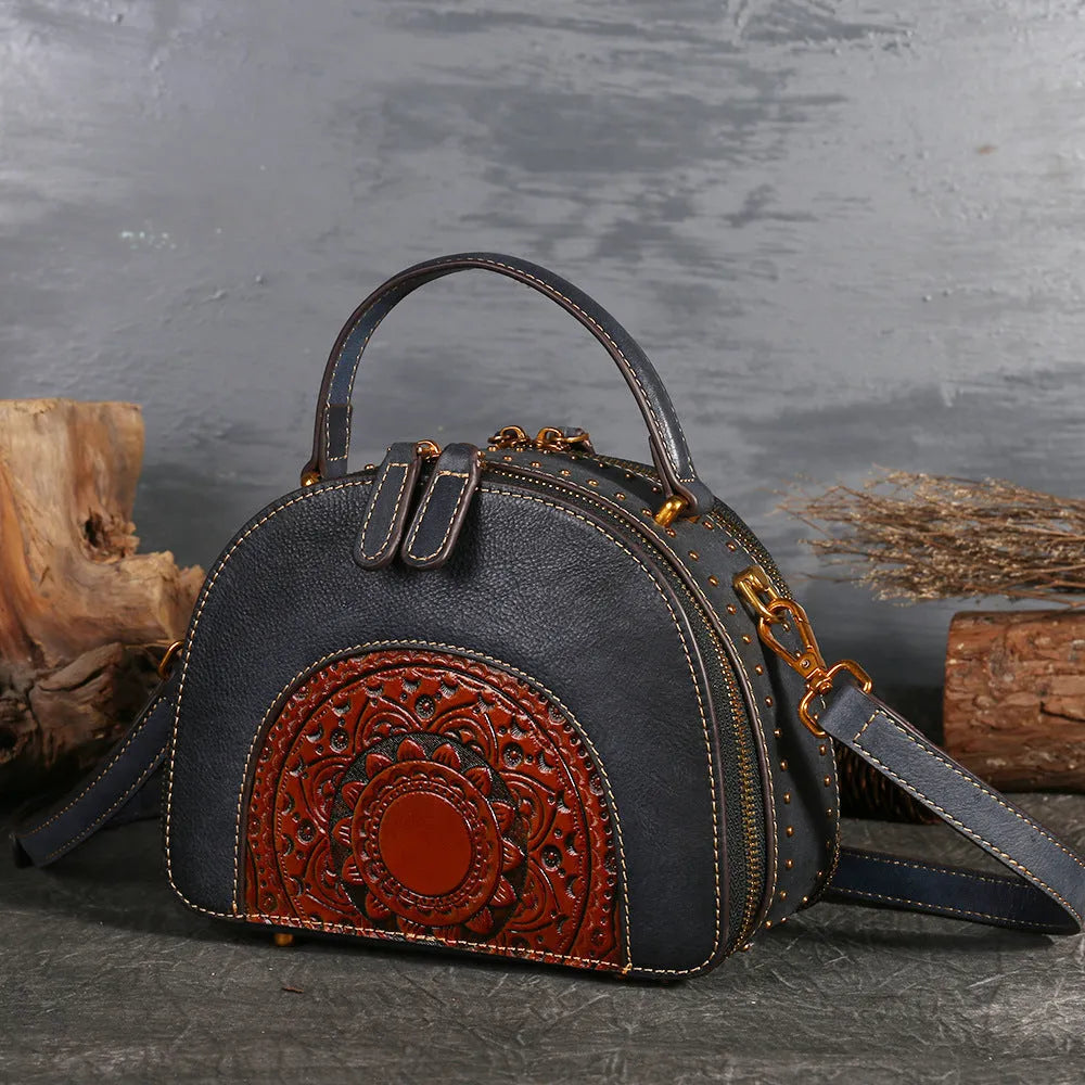 Vintage suede cowhide leather handbag with multiple interior pockets including ID and phone slots.