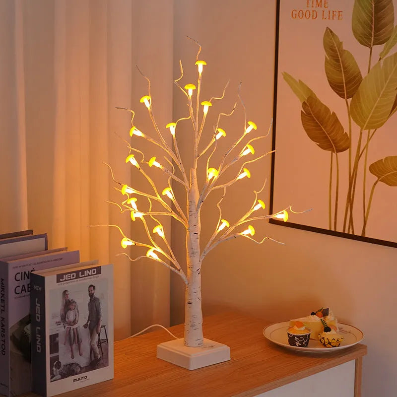 60cm tall white plastic birch tree lamp with small mushroom flowers and warm white LED light.