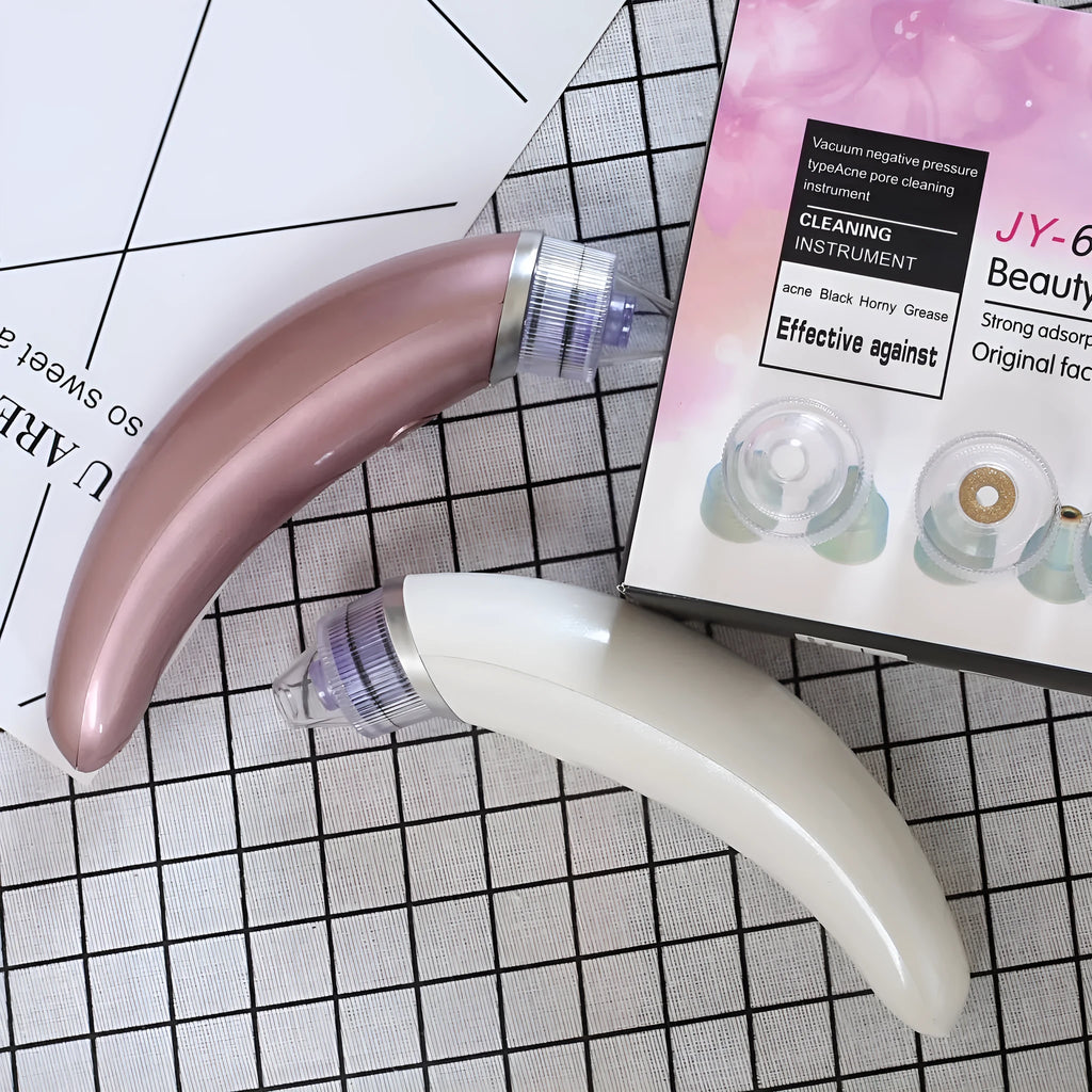 JY-666 rose gold and white electric blackhead suction pore cleanser for face and nose.