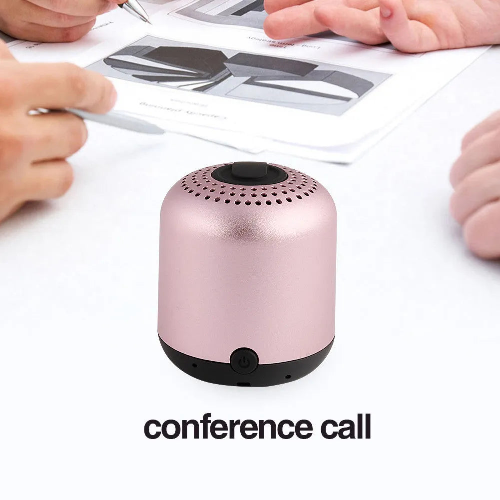 Hieha XQ11 cylindrical metal waterproof Bluetooth speaker in silver colour on a table