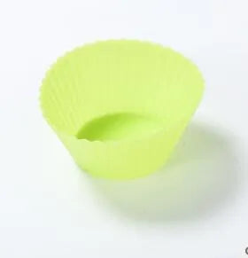 Twelve reusable silicone cupcake liners in six colours, two cups per colour, with a nonstick surface.