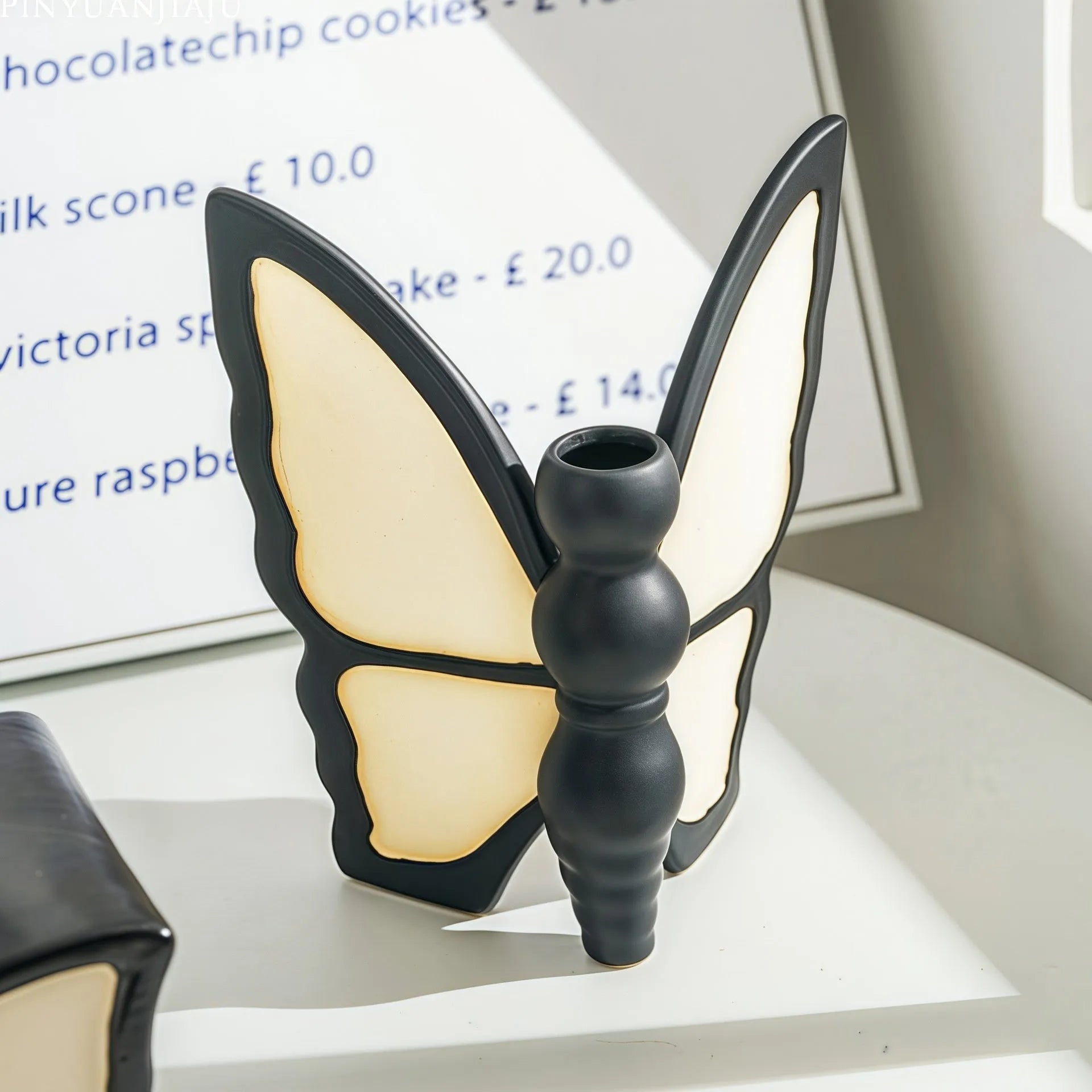 Ceramic butterfly-themed vase and matching waterproof tissue box set for living room decor.