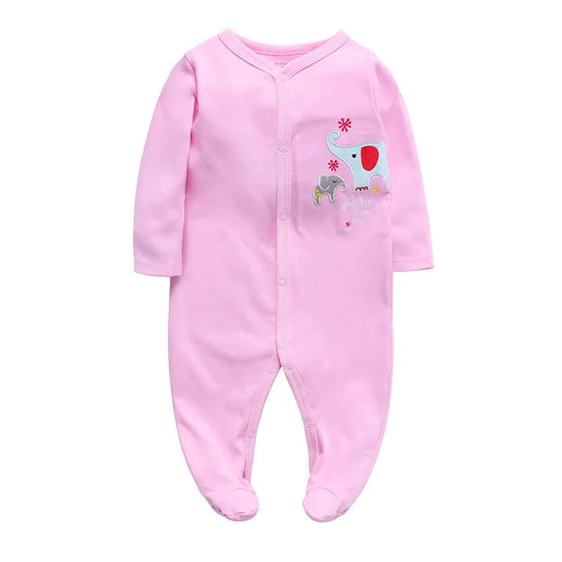 Soft cotton baby one-piece bodysuit in blue and green dinosaur print, size 6M, front view on white background