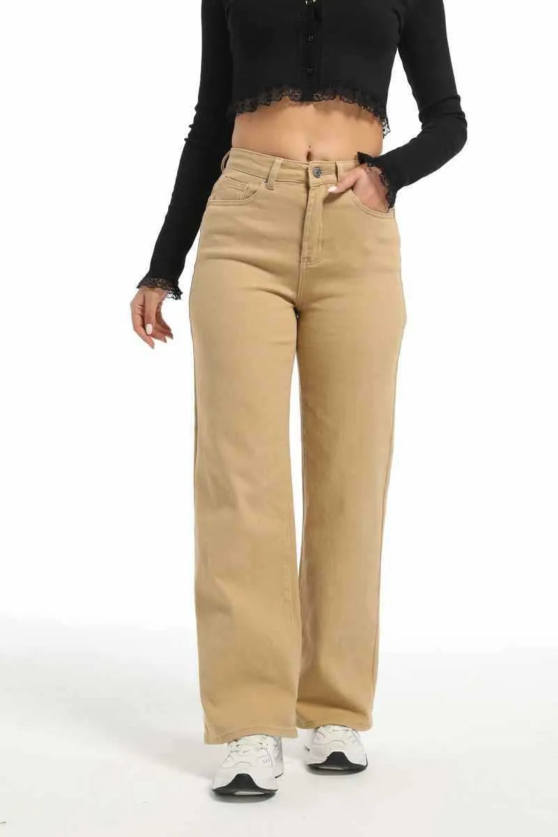 Women's high-waist straight leg jeans in apricot colour with wide leg trouser cut.
