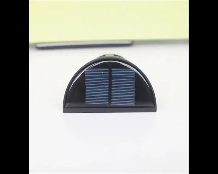 Solar-powered outdoor wall lamp with 6 LEDs and automatic sensor for garden pathway lighting